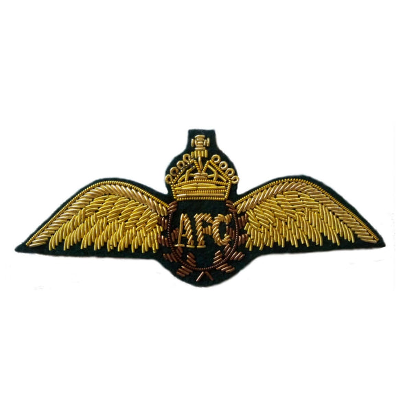 Gold pilot wings on black background with letters 'AFC' in center and gold crown above letters