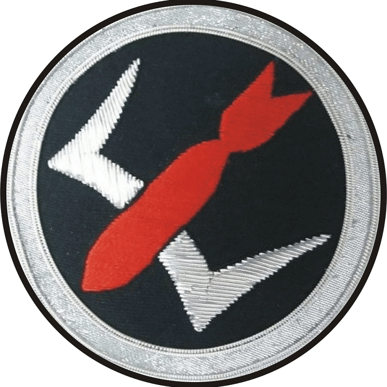 Condor Legion 3/K88 patch with red missile in center of black circle shaped patch with silver outer edging
