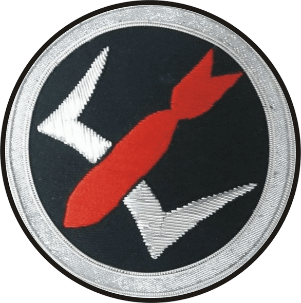 Condor Legion 3/K88 patch with red missile in center of black circle shaped patch with silver outer edging