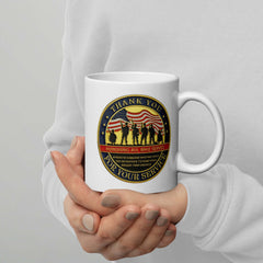 Thank You For Your Service white ceramic mug with full color patriotic graphic on both sides held by girl on her hands