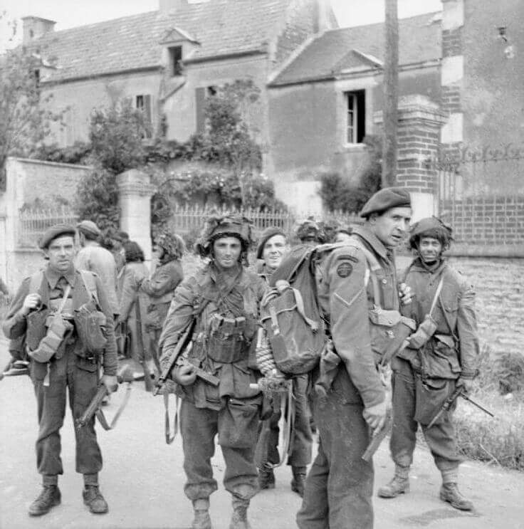 Kieffer and some of his men standing in a French street on D-Day