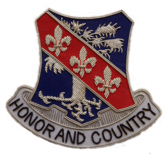 Shield shaped patch with blue background, red banner running top right to bottom left and three Fleur de Lys on it.  Embroidered tree on blue background.  Ribbon along bottom with words 'Honor and Country'