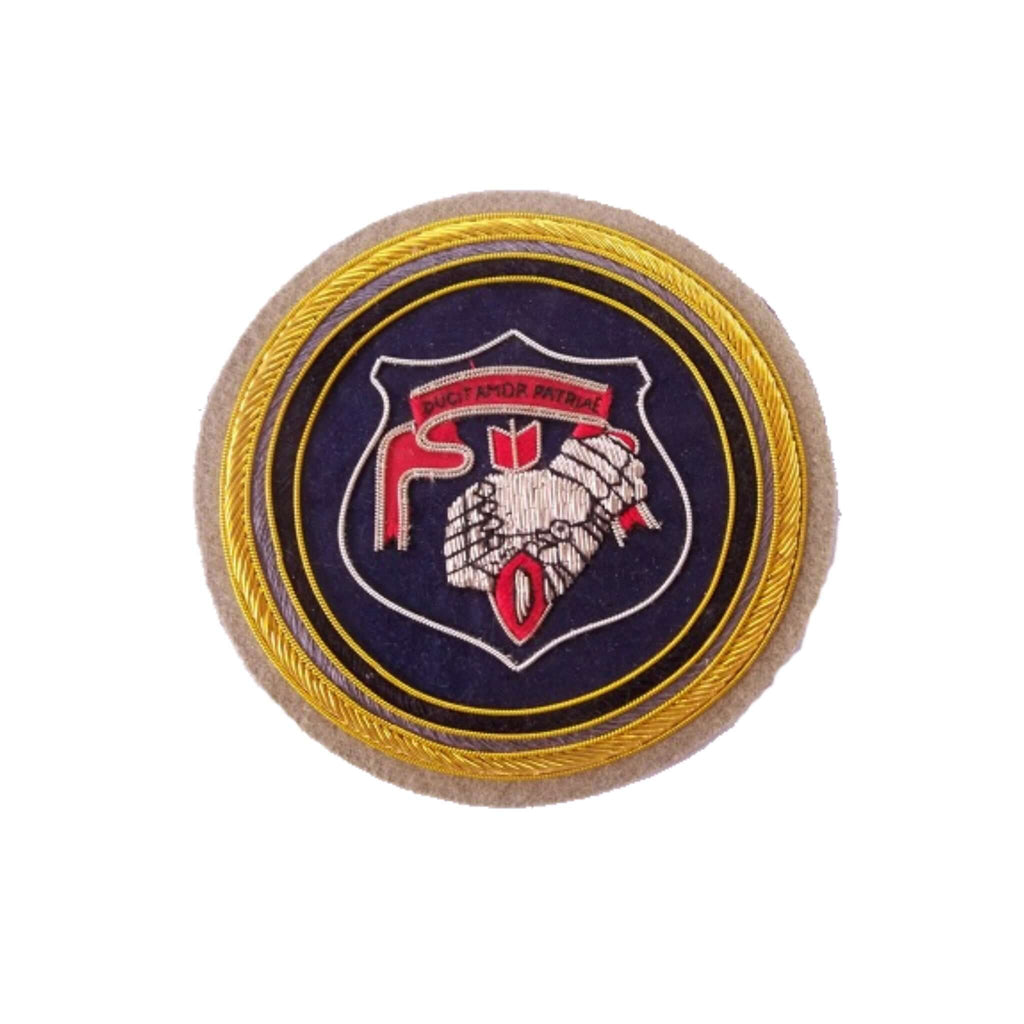 Dark blue circle shaped patch with gold outer ring.  In center is silver gloved hand holding a red ribbon with words 'Ducit Amore Patrea'