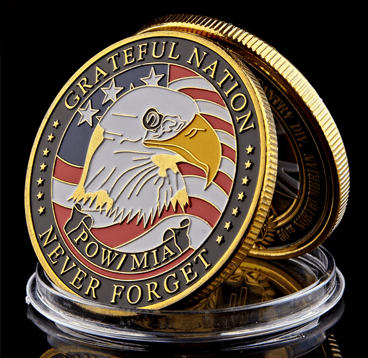 U.S. Military POW MIA Remembrance Coin - front face showing bald eagle head and words Grateful Nation Never Forget POW / MIA 