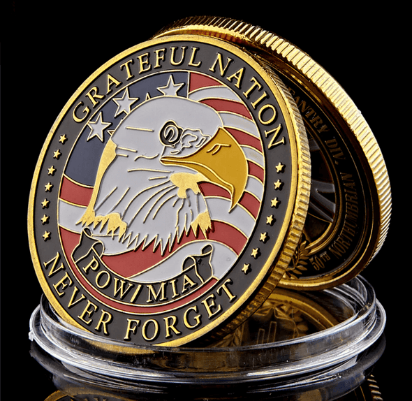 U.S. Military POW MIA Remembrance Coin - front face showing bald eagle head and words Grateful Nation Never Forget POW / MIA 