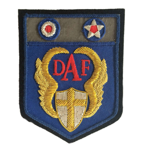 Desert Air Force patch embroidered with gold wings and shield in center, red DAF between wings and silver star and moon above them