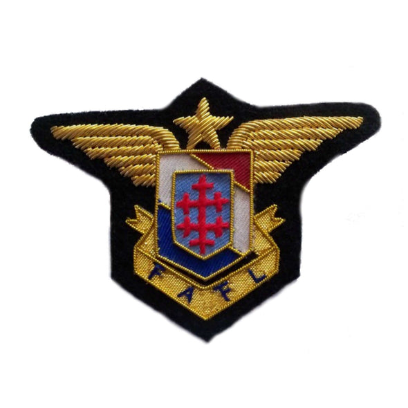 Gold wings with center gold star, above crest and ribbon with FAFL on black background patch
