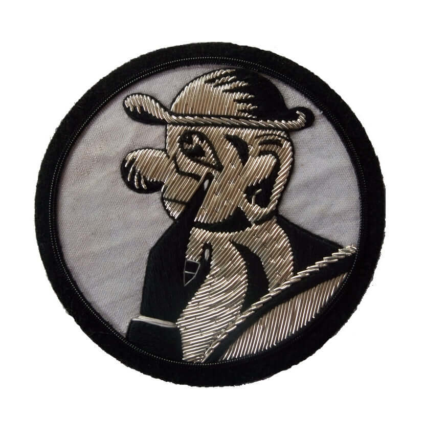 Condor Legion 1/J-88 black and silver patch of man pointing to eye in center of white circle shaped patch