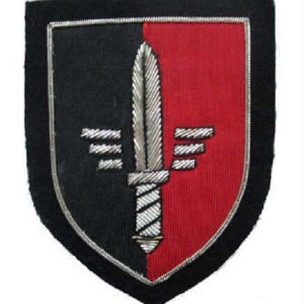 Black and red color shield shaped patch with silver dagger pointing upright in the center