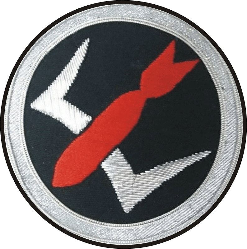 Condor Legion 3/K88 patch with red missile in center of black circle shaped patch with silver outer edging