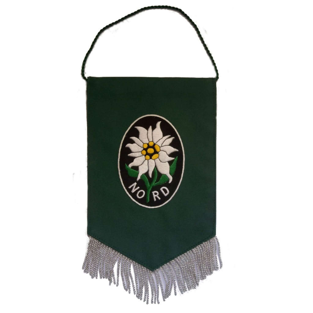 Dark green rectangle shaped pennant with lower edge coming down to a point.  Lower edge has silver fringing.  Center has black oval with white edelweiss with gold center and green stalk with word NORD at bottom of flower.  Green cord at top for hanging pennant