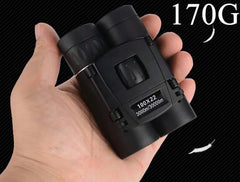 Mini Portable Lightweight Zoom HD 5000M Binoculars - man holding binoculars in left hand
